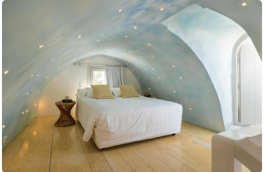 Rocabella Santorini Art Hotel infinity pool with volcano view Imerovigli Greece