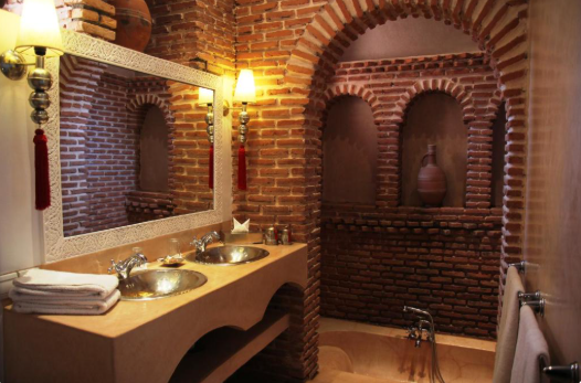 Riad Clementine traditional Moroccan courtyard heated pool zellige tiles Marrakech