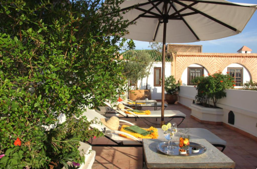 Riad Clementine traditional Moroccan courtyard heated pool zellige tiles Marrakech